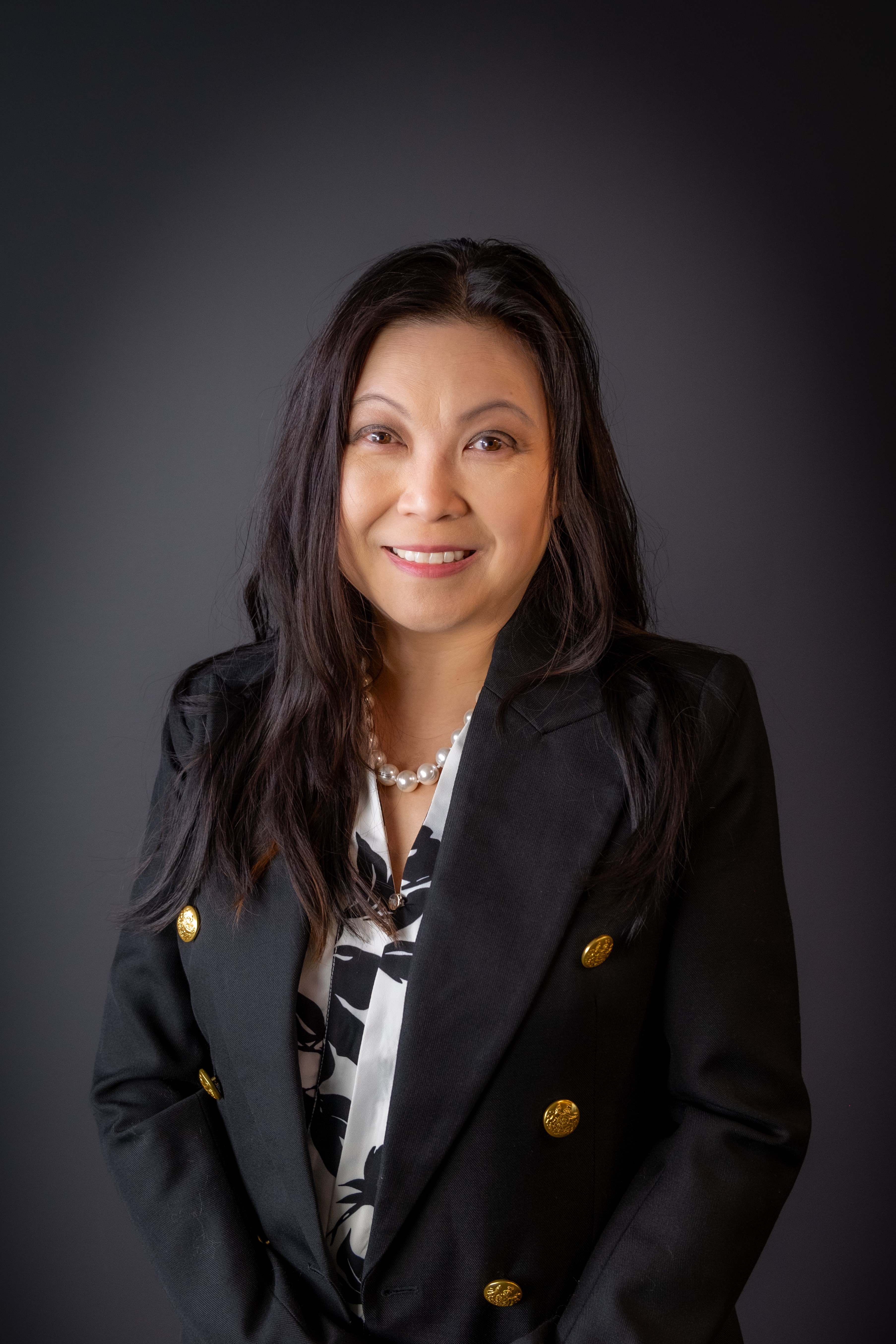 Professional photo of Candra See-Toh, BComm, CPA (CMA, CGA)